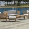 Salon De Jardin En Teck MYLIA : 1 Canapé 3 Places + 2 Fauteuils + 1 Pouf + 1 Table Basse - Naturel Clair - LINERI L 200 Cm X H 79 Cm X P 74 Cm