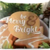 Coussins D'extérieur - Jardin - Citation Pour La Maison Pendant Noël 'Soyez Joyeux Et Lumineux' Sur Un Fond Avec Des Biscuits De Noël - 50x50 Cm